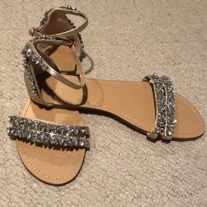 Beautiful gold satin/crystal flats by David’s Bridal.